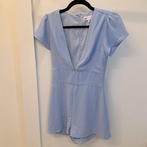 Light blue jumpsuit. No stains good condition. flattering fit and great color